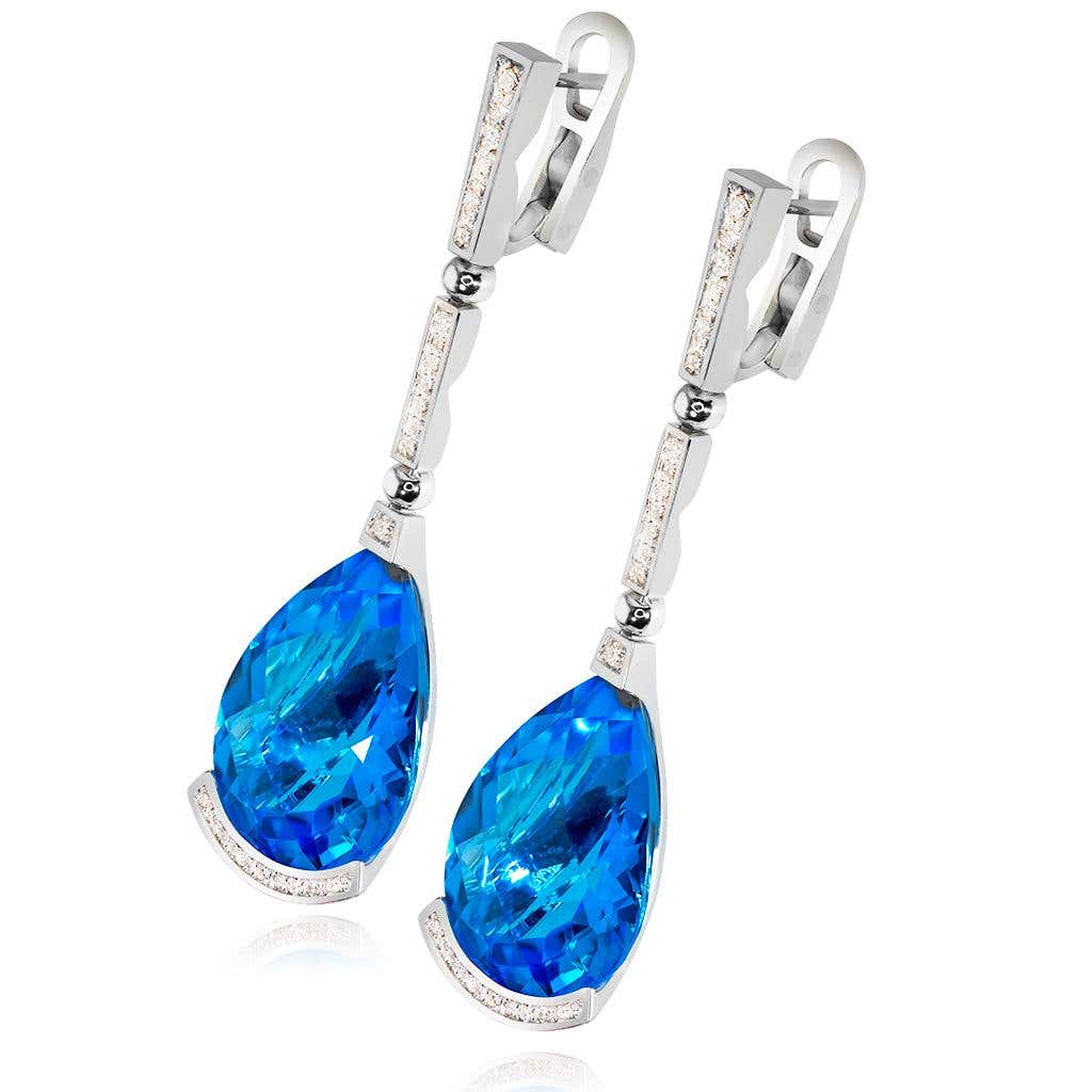 Dark blue topaz shop earrings