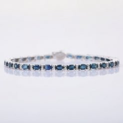 Fine Quality Blue Sapphire Tennis Bracelet in Sterling Silver