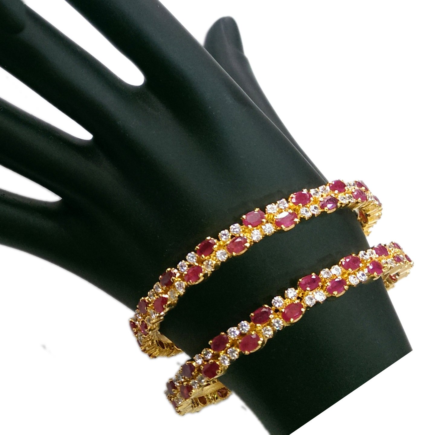 Zircon bangles floral design with emerald and cz stones in gold finish –  Prashanti Sarees