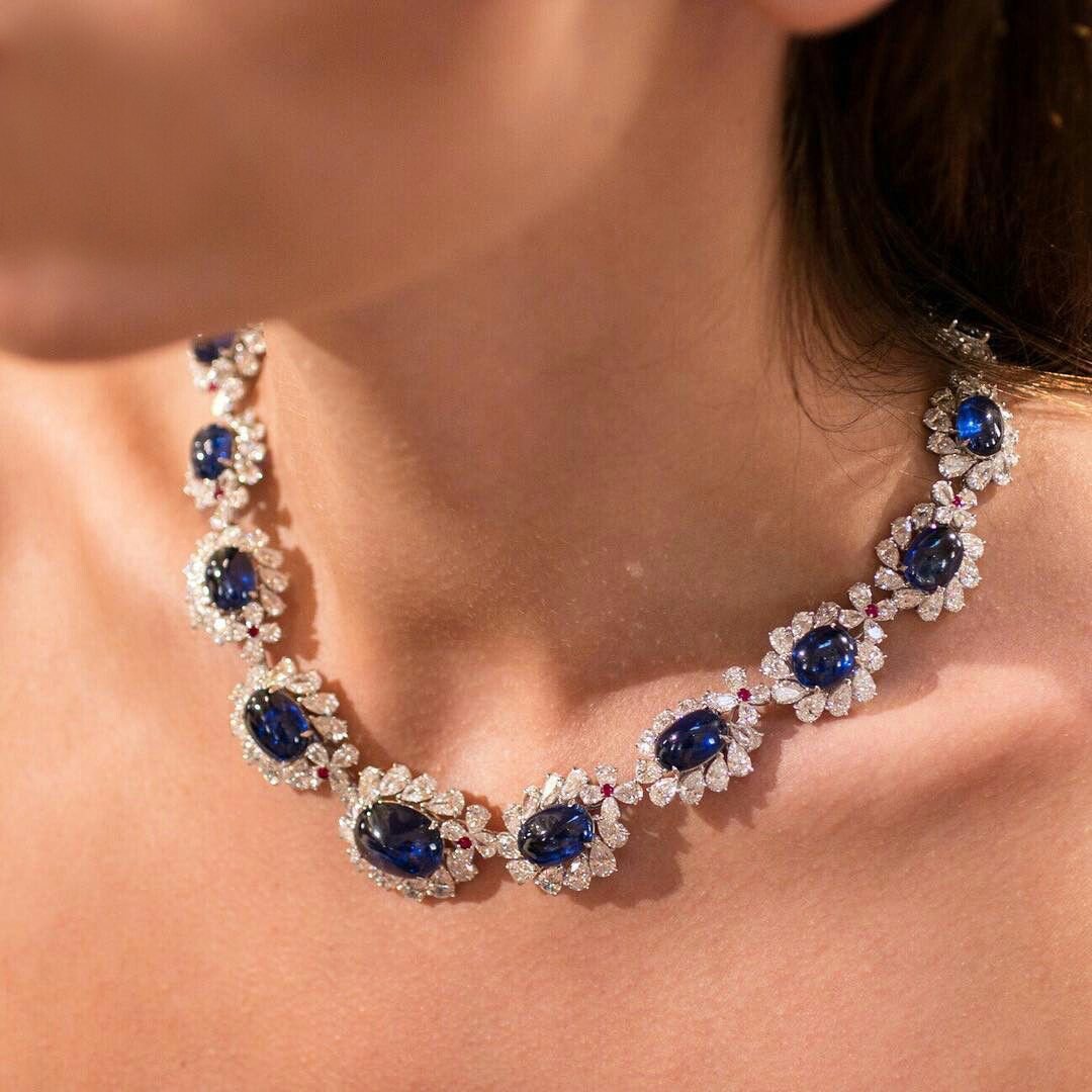 Shop earring and necklace set in blue sapphire and pure silver